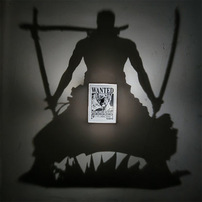 Zoro shadow projection lamp casting a silhouette on the wall