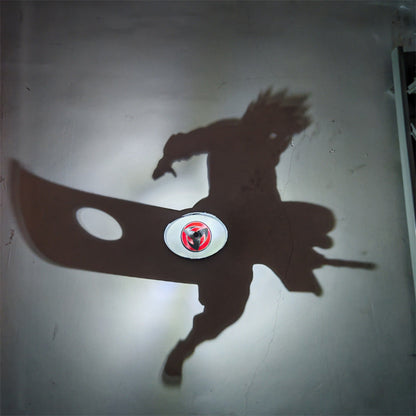 Kakashi shadow lamp casting its silhouette on the wall